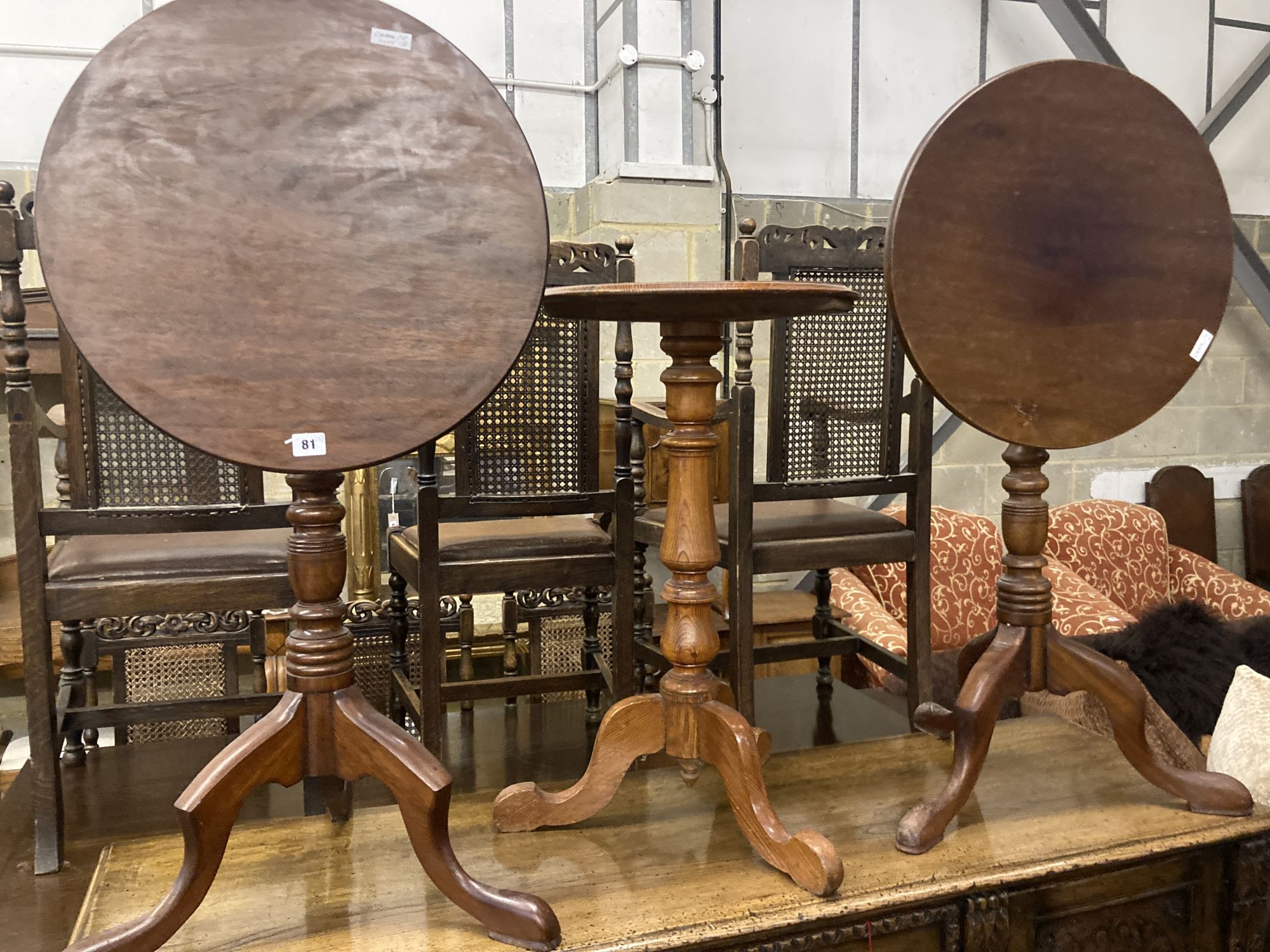 Three Victorian-style mahogany tripod wine tables, largest 49cm diameter